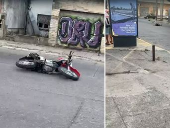 La motocicleta tendida en la calle, luego del trágico episodio. La motocicleta tendida en la calle, luego del trágico episodio.