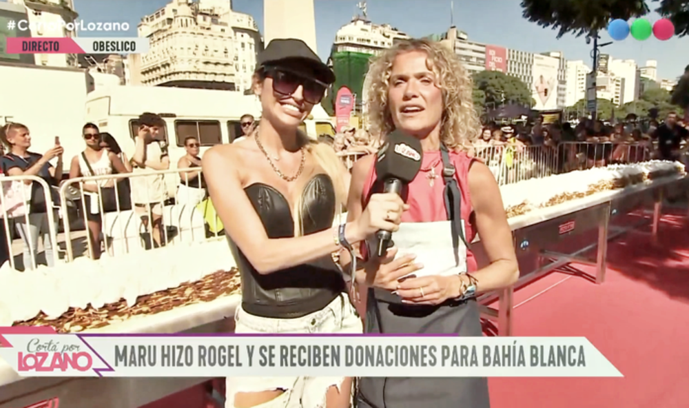 La cocinera MAru Botana preparó un rogel gigante en el Obelisco y lo compartió con todas las personas que se acercaron. (Captura de Video/Telefe)